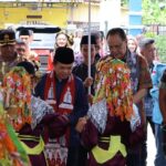 Gubernur Al Haris Serahkan Bantuan Dumisake di Bumi Serentak Galah Serengkuh Dayung